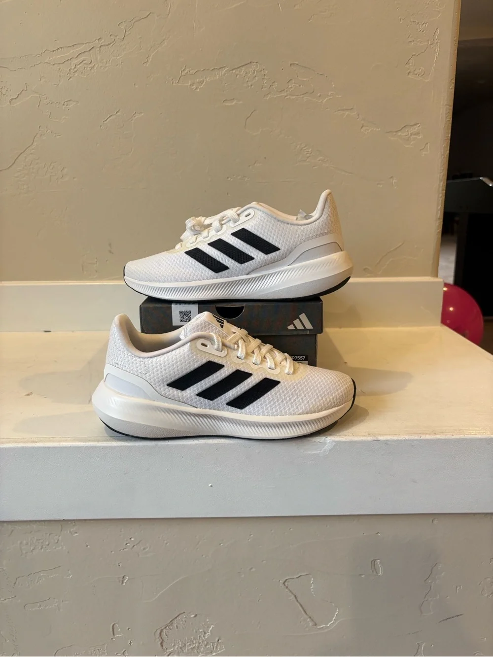 Adidas Women’s White Sneakers with Black Stripes